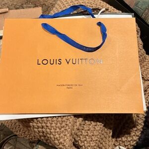 Louis Vuitton Bold Orange Bag with Blue Handles
